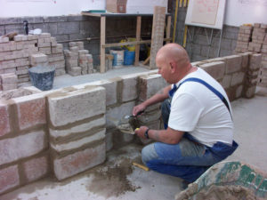 An image of a person bricklaying