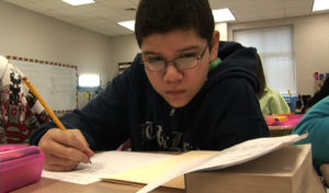 An image showing a student working independently
