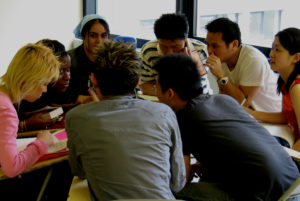 An image of a group of students in discussion