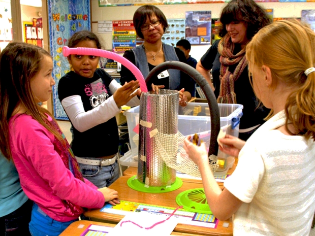 An image of a group of students doing a student experiment